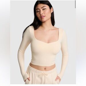 VS PINK Women’s Soft Seamless Notched Long Sleeve Top white Shell color.
